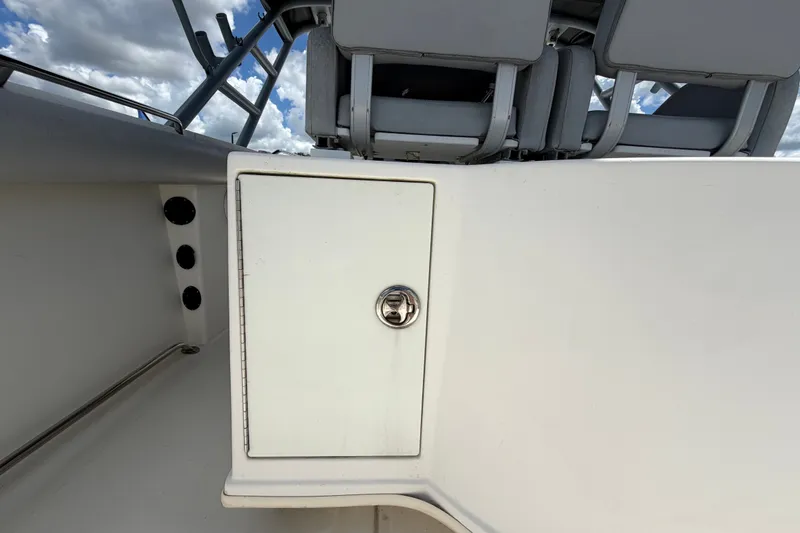 Slide: The Image of 2011 Jefferson Marlago FS35 boat interior with storage compartment and seating. - 22