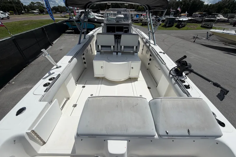 Slide: The Image of 2011 Jefferson Marlago FS35 boat interior with seating and fishing rod holders. - 14