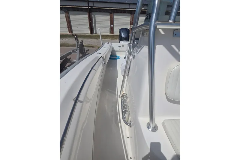Slide: The Image of 2009 Cape Horn 31XS boat interior with stainless steel railings and seating. - 13