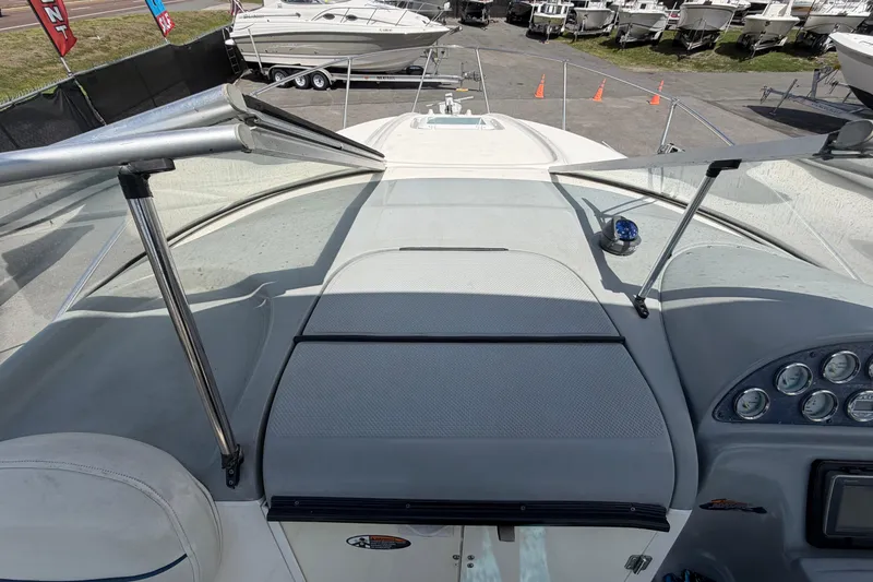 Slide: The Image of 2004 Bayliner 2452 Ciera Express dashboard view with gauges and windshield. - 60