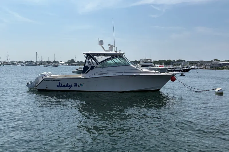 Slide: The Image of 2007 Grady-White Express 360 boat anchored in a calm harbor. - 6