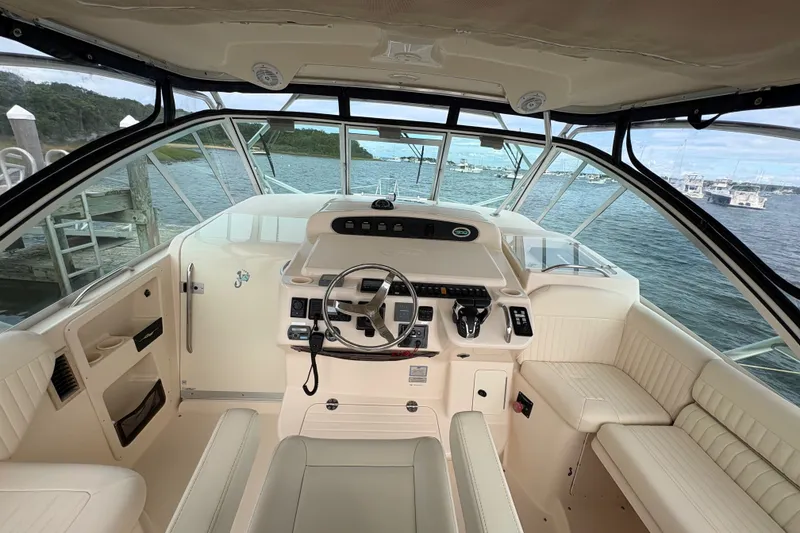 Slide: The Image of 2007 Grady-White Express 360 boat interior with helm, steering wheel, and seating. - 15