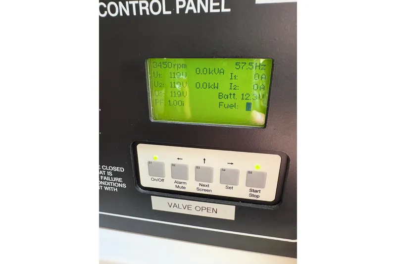Slide: The Image of Control panel display on a 2007 Grady-White Express 360 boat, showing electrical readings. - 36