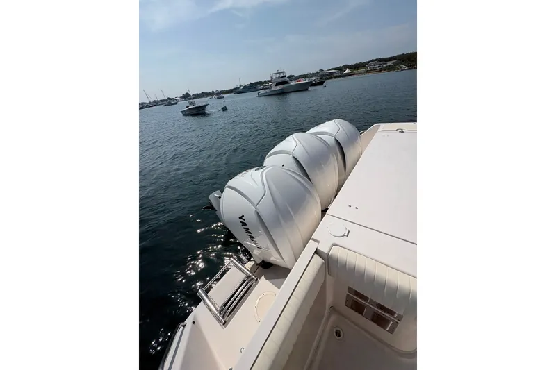 Slide: The Image of 2007 Grady-White Express 360 with Yamaha engines on calm water. - 13
