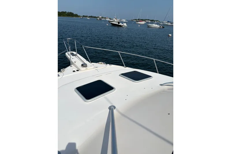 Slide: The Image of 2007 Grady-White Express 360 boat deck with ocean view and distant boats. - 28