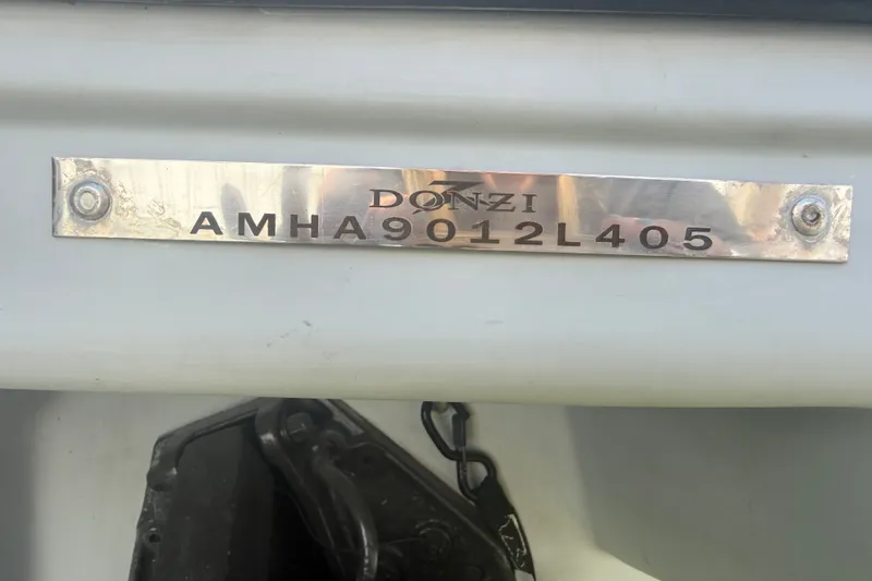 Slide: The Image of 2004 Donzi 29 ZF Open boat identification plate with serial number. - 60