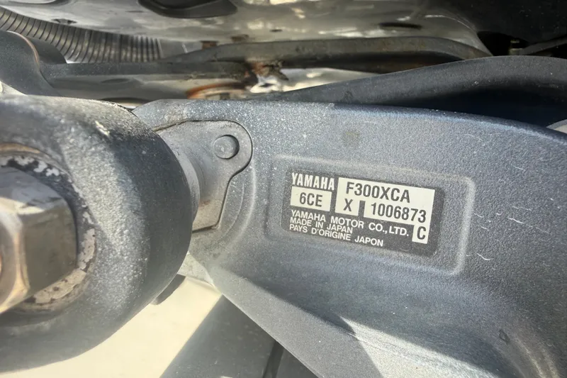 Slide: The Image of Close-up of Yamaha F300XCA engine label on a 2004 Donzi 29 ZF Open boat. - 62
