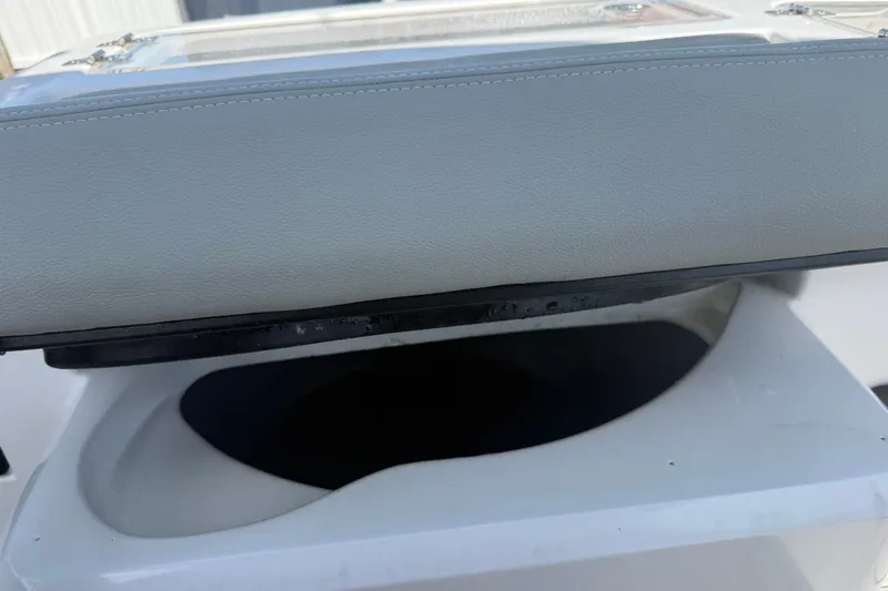 Slide: The Image of 2004 Donzi 29 ZF Open boat seat detail with white upholstery. - 47