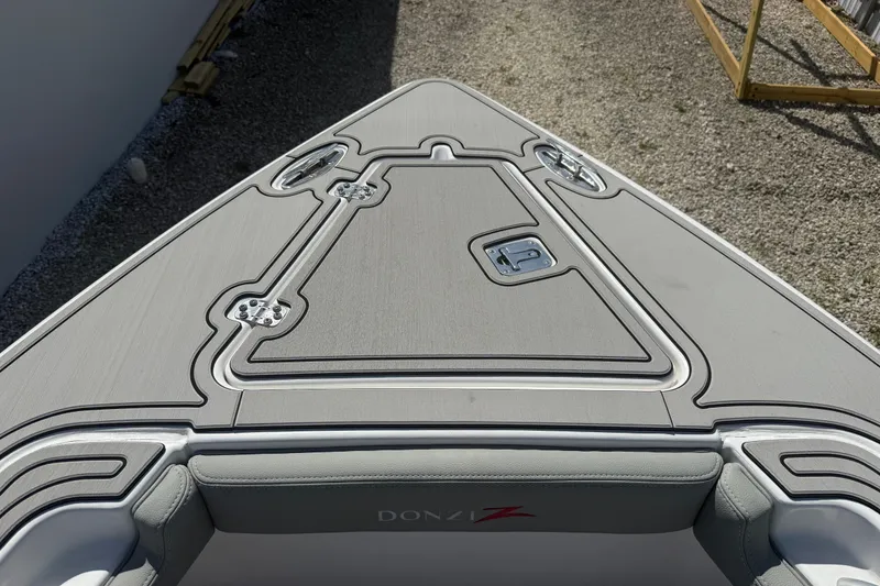 Slide: The Image of 2004 Donzi 29 ZF Open boat deck, featuring sleek design and modern fittings. - 40