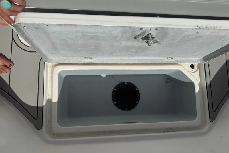 Slide: The Image of Open storage compartment on a 2004 Donzi 29 ZF Open boat. - 57