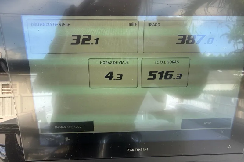 Slide: The Image of Garmin display showing travel data for 2004 Donzi 29 ZF Open boat. - 29