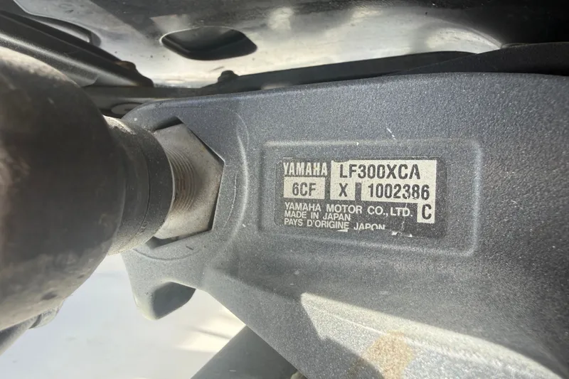 Slide: The Image of Yamaha LF300XCA engine label on a 2004 Donzi 29 ZF Open boat. - 61
