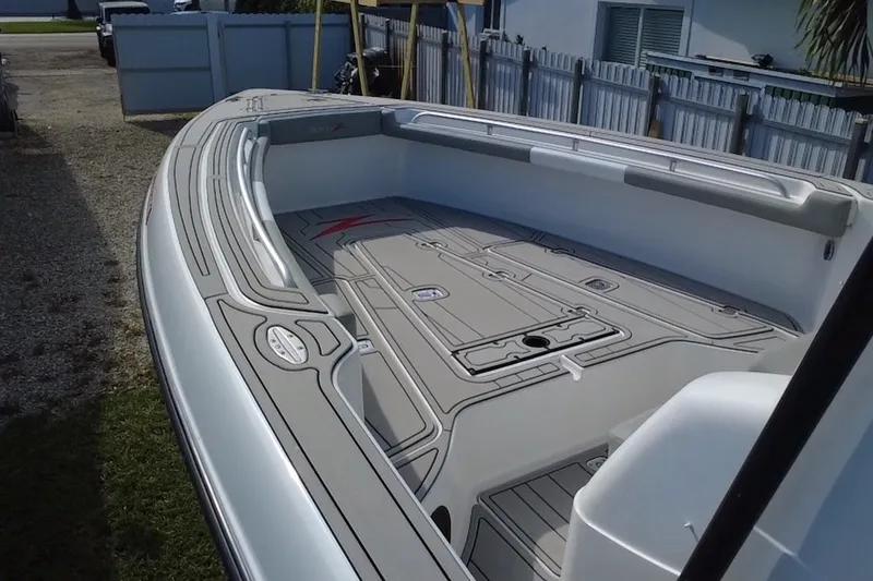 Slide: The Image of 2004 Donzi 29 ZF Open boat interior with sleek design and spacious deck. - 42