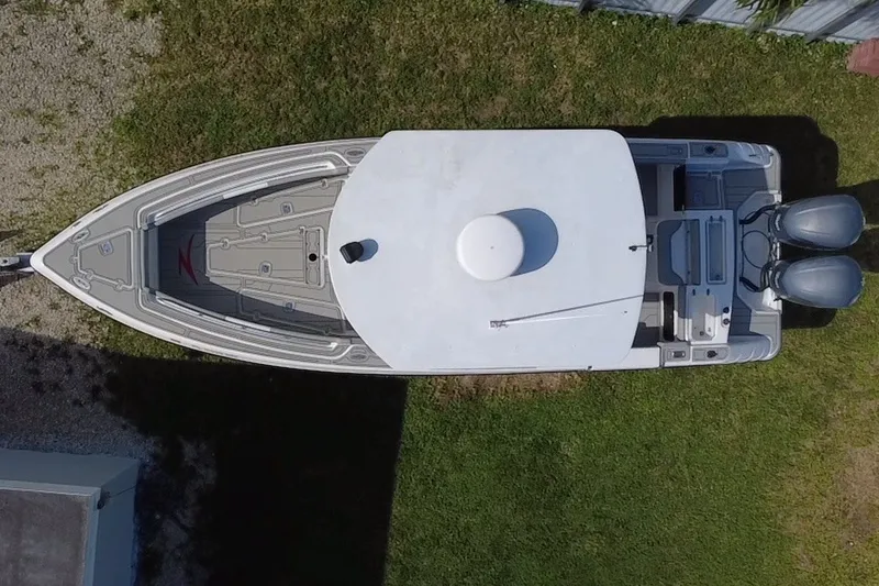 Slide: The Image of Top view of a 2004 Donzi 29 ZF Open boat with dual engines. - 19