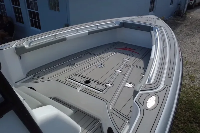 Slide: The Image of 2004 Donzi 29 ZF Open boat interior with sleek, modern design and spacious layout. - 43