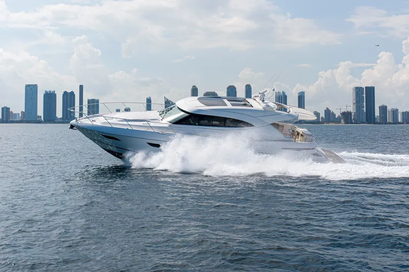Slide: The Image of 2019 Riviera 6000 Sport Yacht cruising  - 17