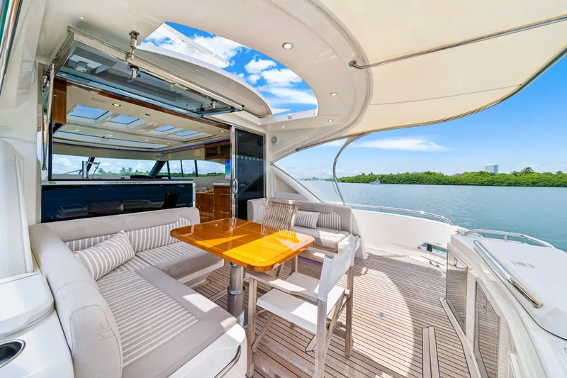 Slide: The Image of 2019 Riviera 6000 Sport Yacht with elegant outdoor seating  - 18