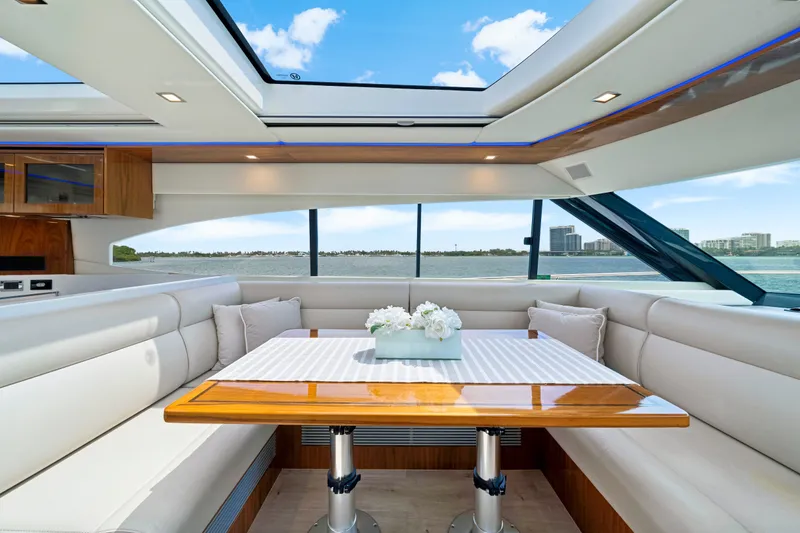 Slide: The Image of  Riviera 6000 Sport Yacht - main dining - 31