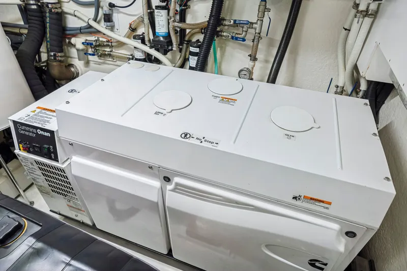 Slide: The Image of Cummins Onan generator in 2019 Riviera 6000 Sport Yacht engine room - 65