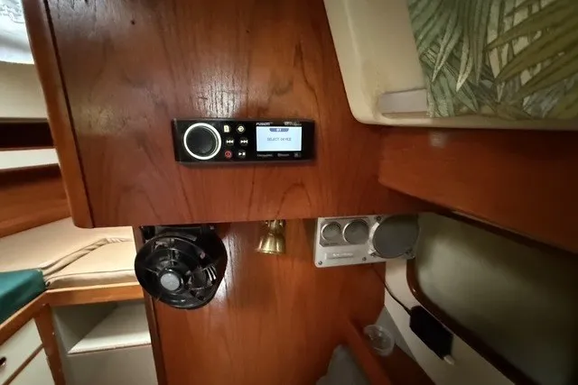 Slide: The Image of Interior of 1981 C&C Landfall 38 sailboat with control panel and fan. - 21