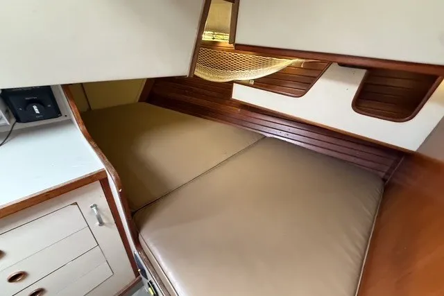 Slide: The Image of Interior cabin of 1981 C&C Landfall 38 sailboat with cozy sleeping area. - 20