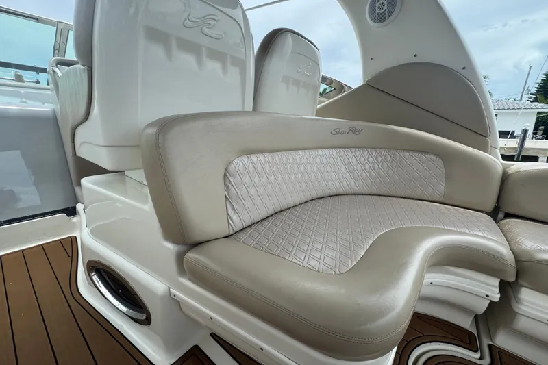 Slide: The Image of Luxurious seating on a 2004 Sea Ray 340 Sundancer boat with elegant upholstery design. - 15