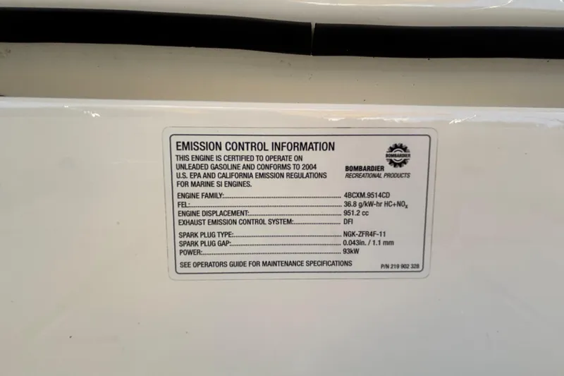 Slide: The Image of 2004 Sea-Doo Sportster LE DI emission control label with engine specifications and compliance details. - 42