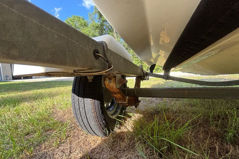 Slide: The Image of Underneath view of a 2004 Sea-Doo Sportster LE DI boat on a trailer. - 36