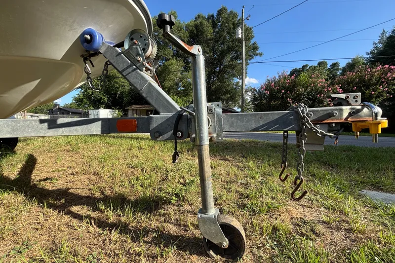 Slide: The Image of Trailer hitch of a 2004 Sea-Doo Sportster LE DI boat on grassy ground. - 35