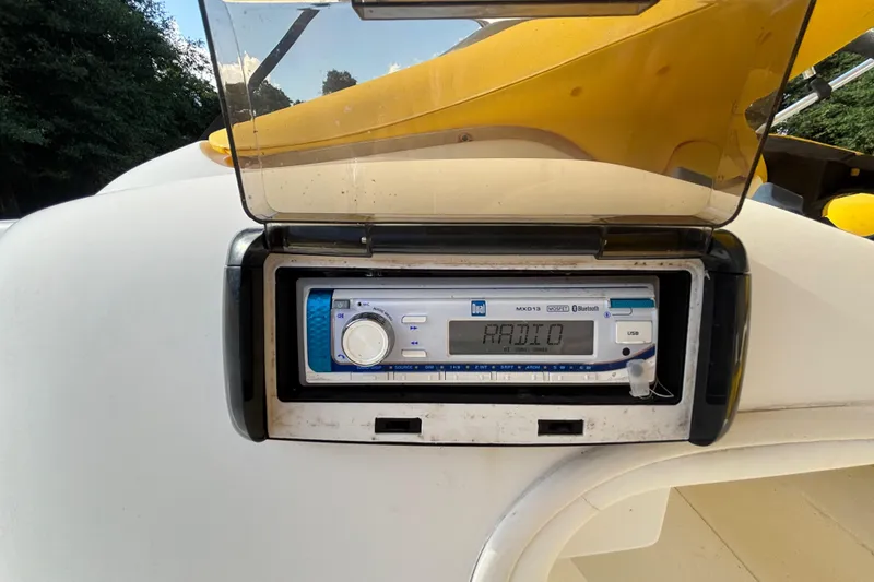 Slide: The Image of 2004 Sea-Doo Sportster LE DI boat stereo system with Bluetooth and USB connectivity. - 28