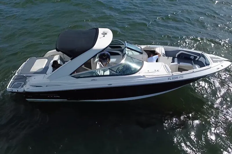 Slide: The Image of 2011 Monterey 328SS Super Sport boat cruising on open water. - 3