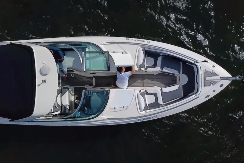 Slide: The Image of Aerial view of a 2011 Monterey 328SS Super Sport boat on water. - 11