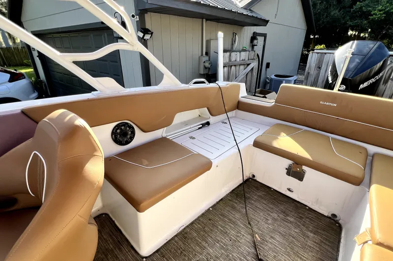 Slide: The Image of 2019 Glastron GTD 220 boat interior with tan seating and modern design. - 40