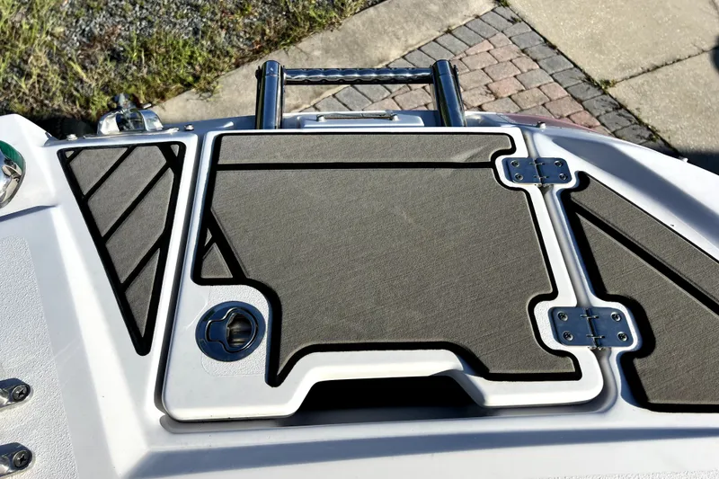 Slide: The Image of 2019 Glastron GTD 220 boat deck with hatch and ladder. - 66