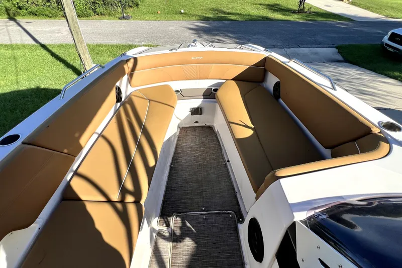 Slide: The Image of 2019 Glastron GTD 220 boat interior with tan seating and spacious layout. - 58