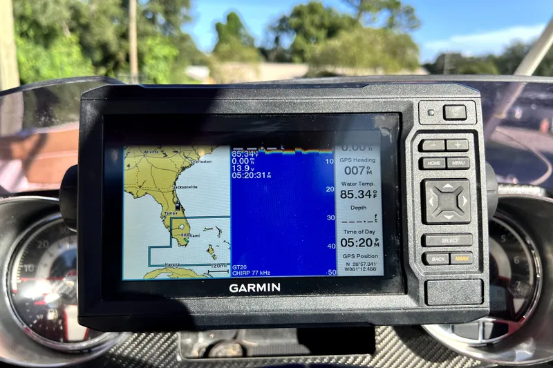 Slide: The Image of Garmin GPS display on 2019 Glastron GTD 220 boat, showing Florida map and data. - 31