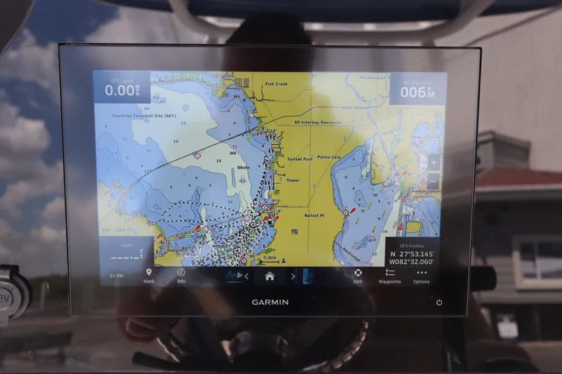 Slide: The Image of Garmin GPS display on 2022 Sportsman Masters 247 Bay Boat, showing detailed nautical map. - 19