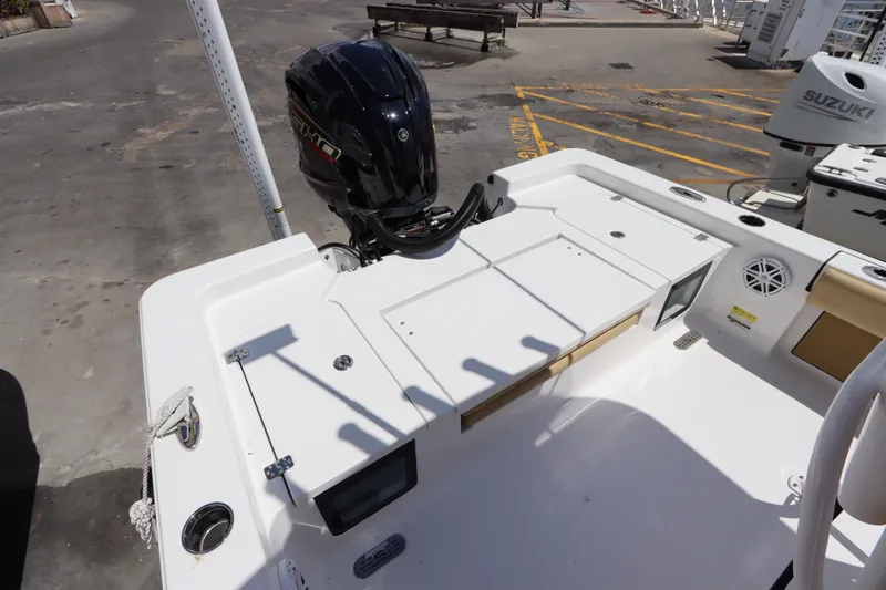 Slide: The Image of 2022 Sportsman Masters 247 Bay Boat with Yamaha outboard engine, docked at marina. - 8