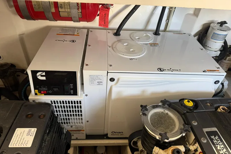 Slide: The Image of Engine room of 2011 Tiara Yachts 4500 Sovran with Cummins Onan generator. - 85