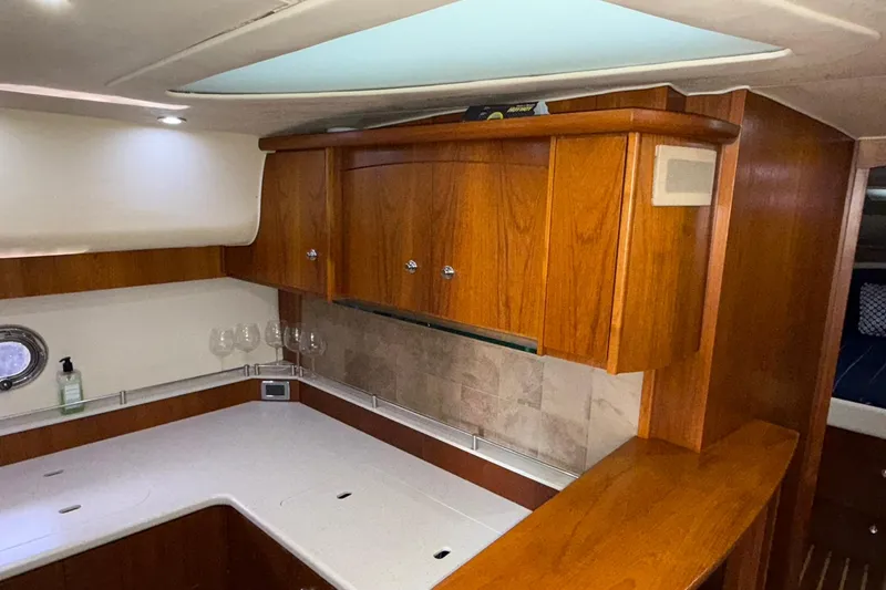 Slide: The Image of Luxurious 2011 Tiara Yachts 4500 Sovran interior with elegant wood cabinetry. - 61