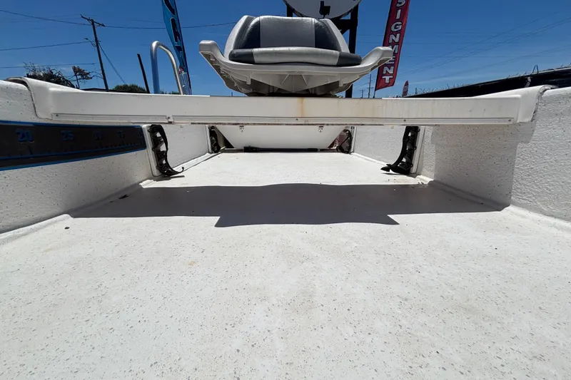 Slide: The Image of 2010 Carolina Skiff JV15TH boat interior with seating and measurement markings. - 14