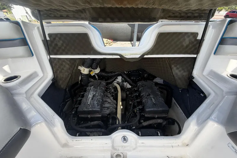 Slide: The Image of 2020 Yamaha Boats AR240 engine compartment, showcasing dual engines and interior design. - 55