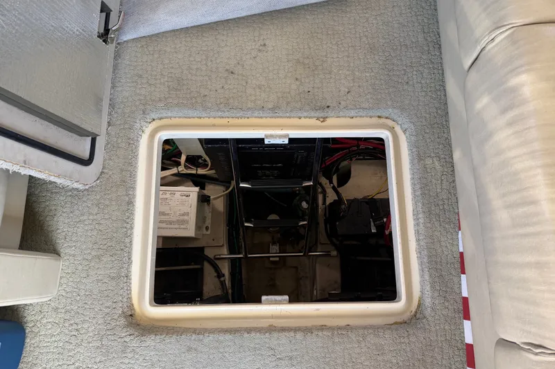 Slide: The Image of Access hatch to engine compartment of 2010 Sea Ray 390 Sedan Bridge yacht. - 131