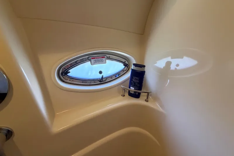 Slide: The Image of Bathroom window and toiletries in 2010 Sea Ray 390 Sedan Bridge yacht. - 117