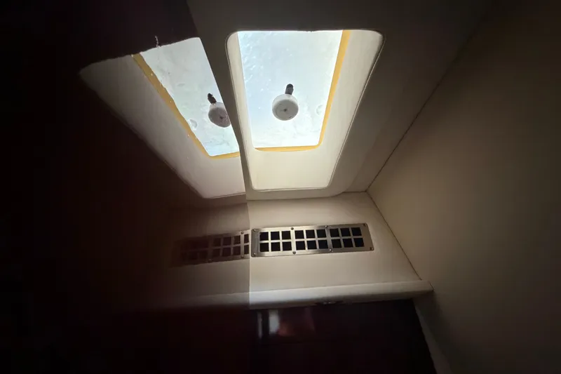 Slide: The Image of Interior view of 2010 Sea Ray 390 Sedan Bridge with skylight and vent. - 125