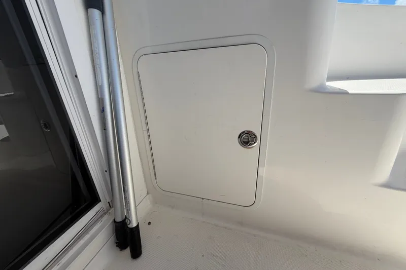 Slide: The Image of Compartment door on 2010 Sea Ray 390 Sedan Bridge yacht deck. - 25