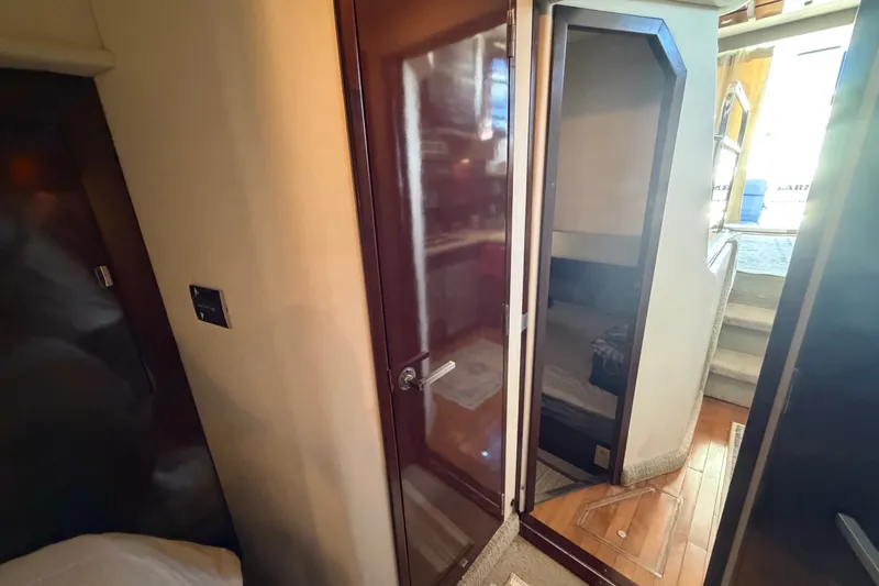 Slide: The Image of Interior view of 2010 Sea Ray 390 Sedan Bridge, featuring cabin and stairs. - 113