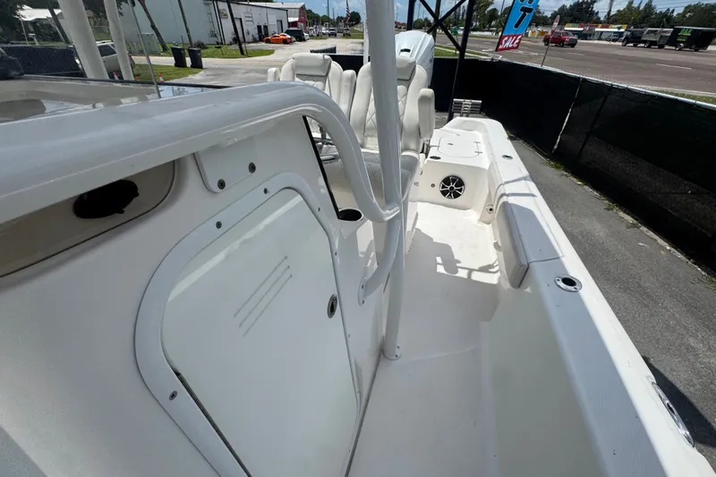 Slide: The Image of 2019 Blue Wave 2800 Pure Hybrid boat interior, showcasing seating and deck layout. - 46