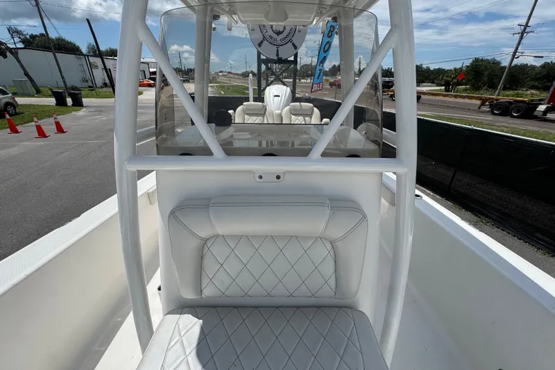 Slide: The Image of 2019 Blue Wave 2800 Pure Hybrid boat interior with white seating and console. - 43