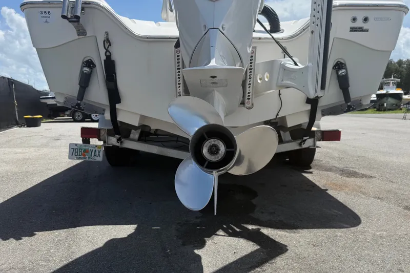 Slide: The Image of Rear view of a 2019 Blue Wave 2800 Pure Hybrid boat with visible propeller. - 7
